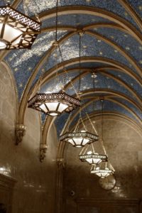 Close-up shot of blue dome ceiling and light fixtures